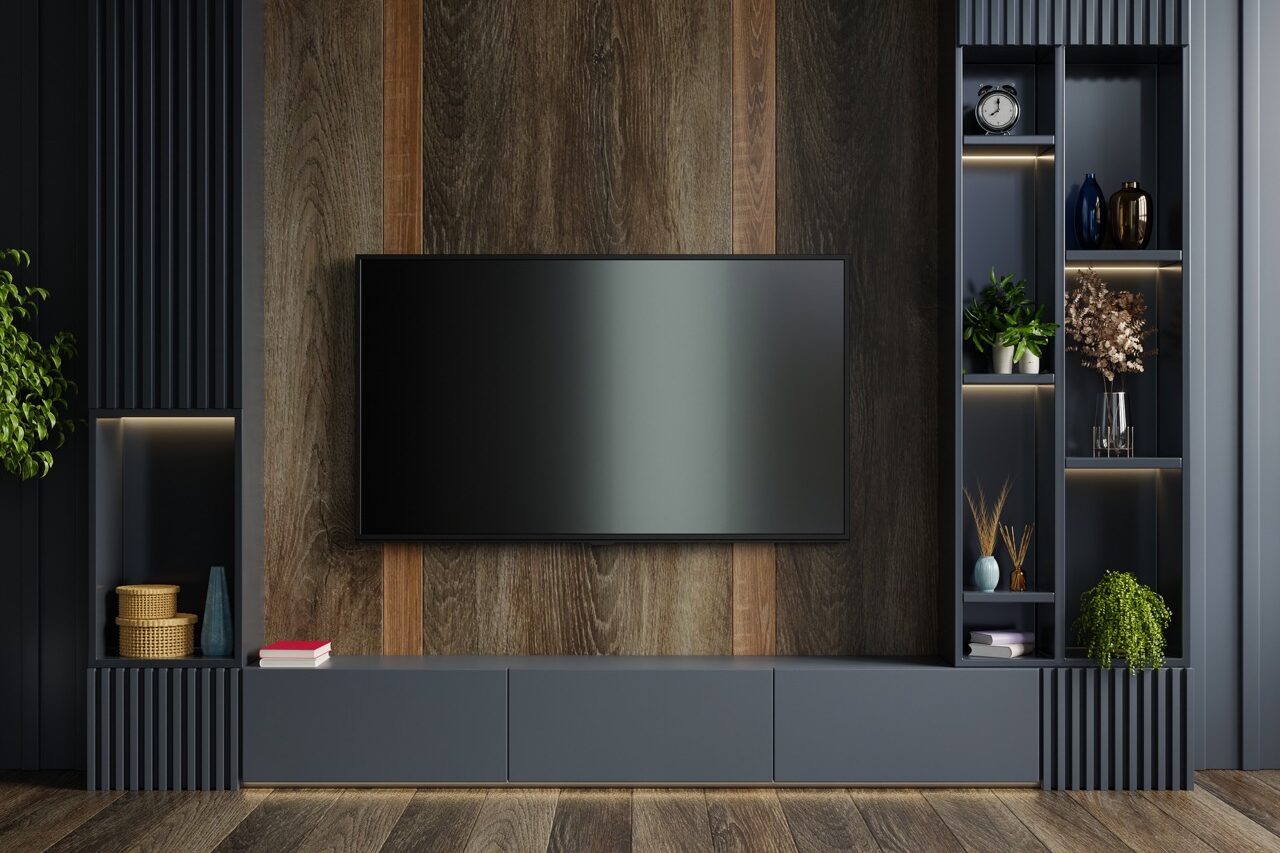 Wooden wall mounted tv in modern living room with decoration on dark wall background.3D rendering